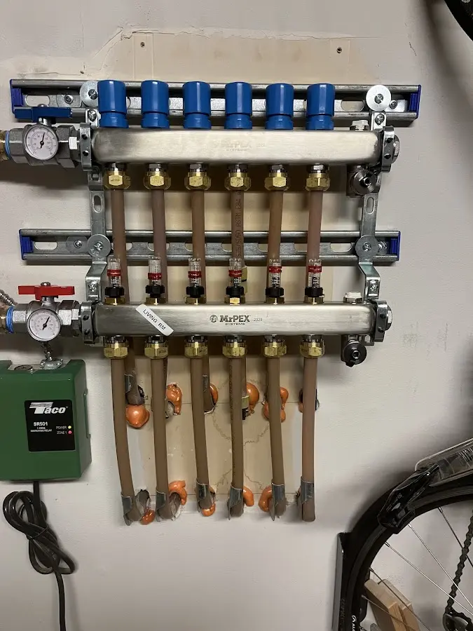 Plumber performing Leak Detection at a residential property in Marcy